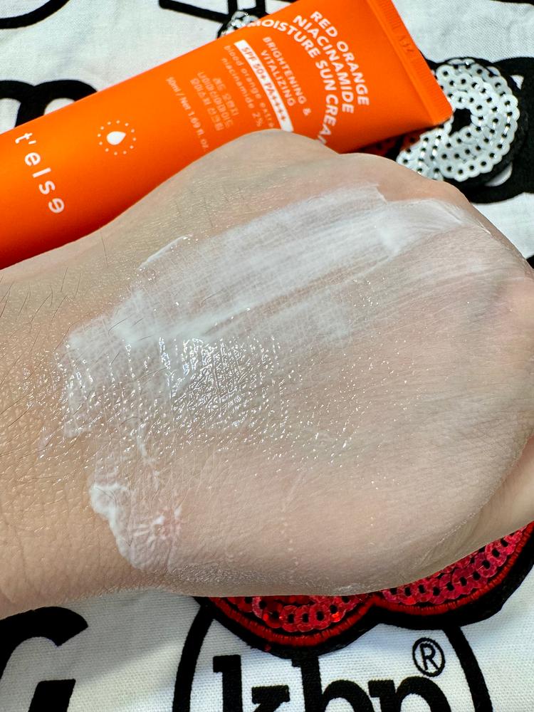 T'else Red Orange Niacinamide Moisture Sun Cream SPF50+ T'else Red Orange Niacinamide Moisture Sun Cream SPF50+