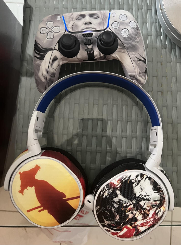 Custom PS5 Controller Skins & Wraps - Customer Photo From 7200-8626 DHL EasyShop QA (Brian Eric Musobo)