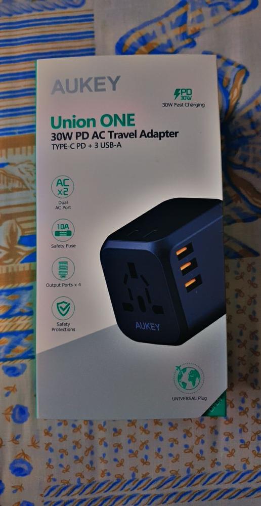 Aukey Universal Adapter with 30W PD Port with International Compatibility & 4 Types of International Plug – PA-TA04 - Customer Photo From Zee