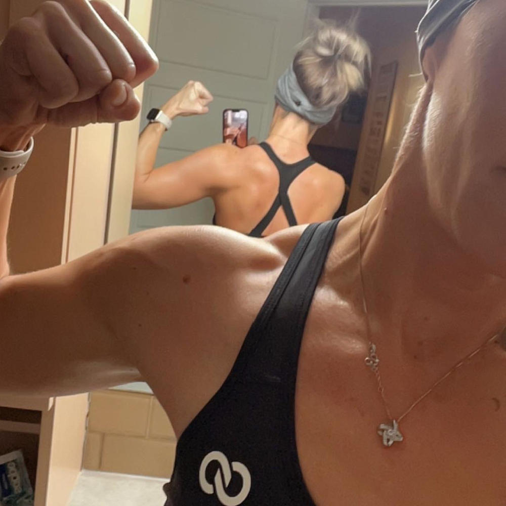 Deep Black Motion Emblem Sports Bra - Customer Photo From Jen Chester