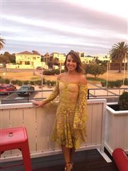 Bianca P. verified customer review of Marigold Mini Dress