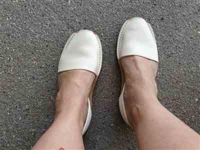 Anonymous verified customer review of Ivory White leather